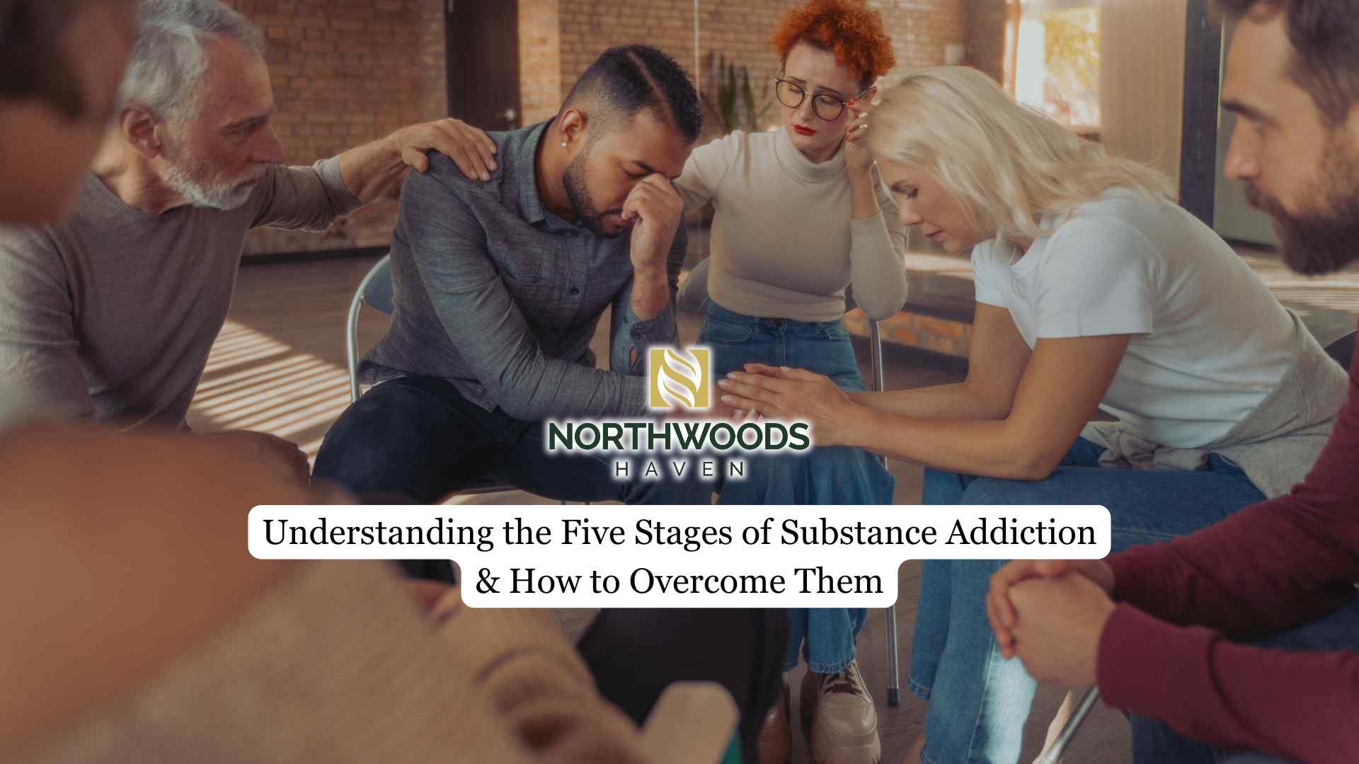 Support group comforting a distressed man