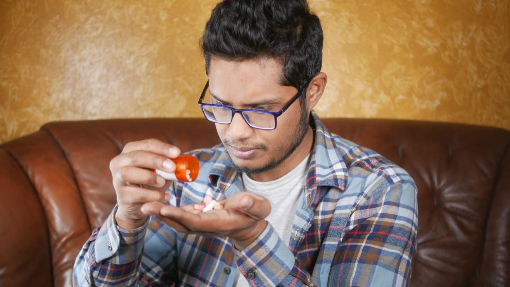 man inspecting Benzodiazepines 