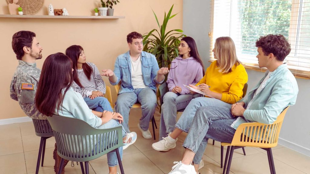 Group therapy session for inhalant addiction treatment and recovery
