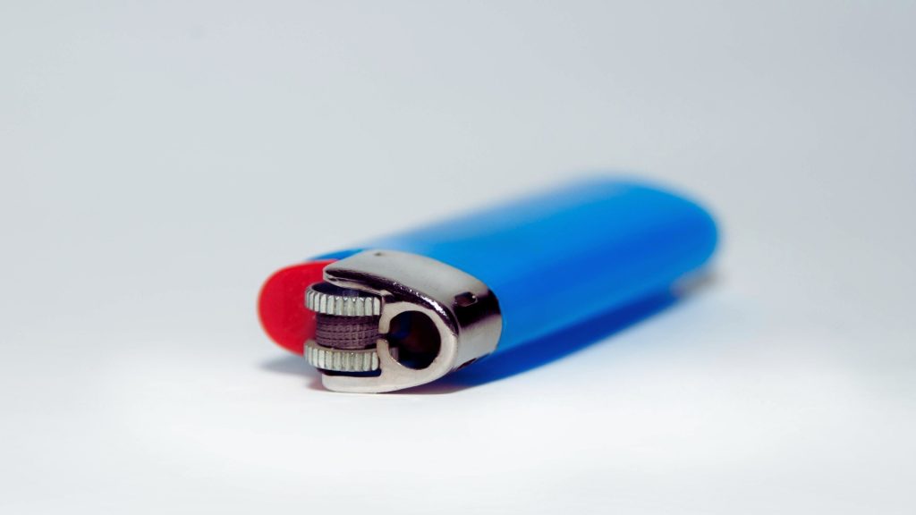 Disposable lighter representing common household products linked to Sudden Sniffing Death Syndrome.