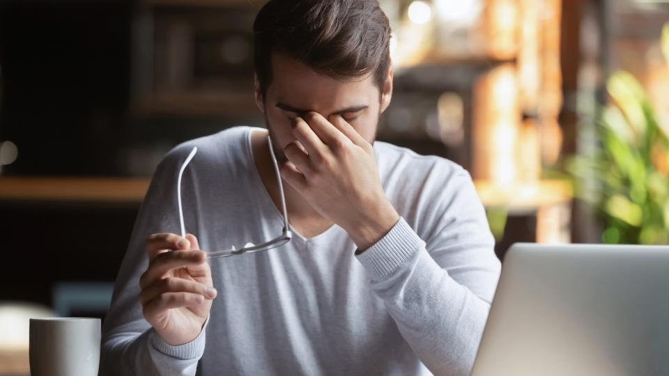 a man experiences nausea while greening out.